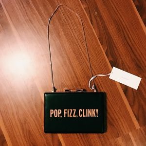 Kate Spade rose gold and black cross body